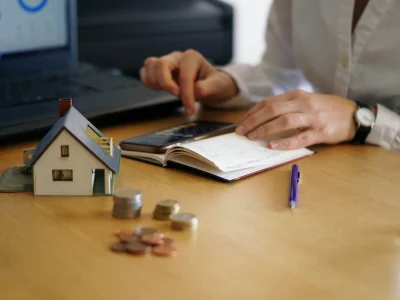 closeup_shot_person_thinking_buying_selling_house_1