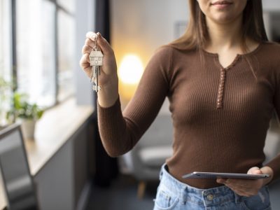 front-view-woman-holding-keys