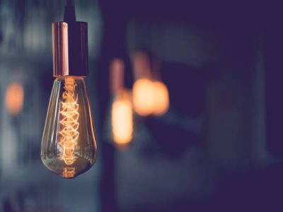 Vintage electric light.Decorative antique edison style light bulbs in coffee shop.vintage tone